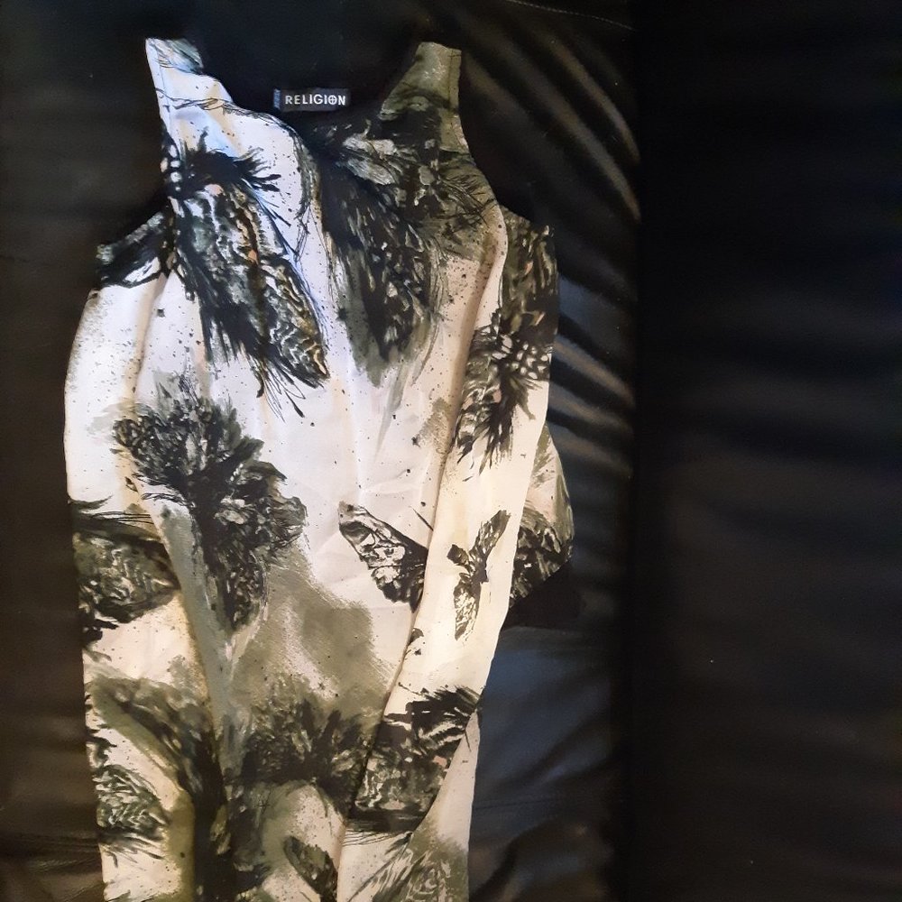 Religion Asymmetric Top